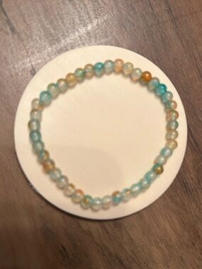 Q -Beaded Stretch Bracelet - Blue and Gold Tones